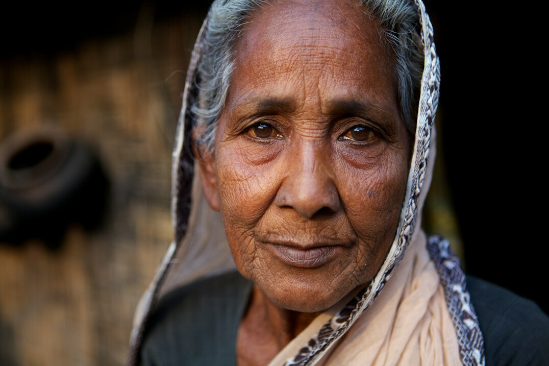 Portrait of an elderly Danish woman sitting in her home