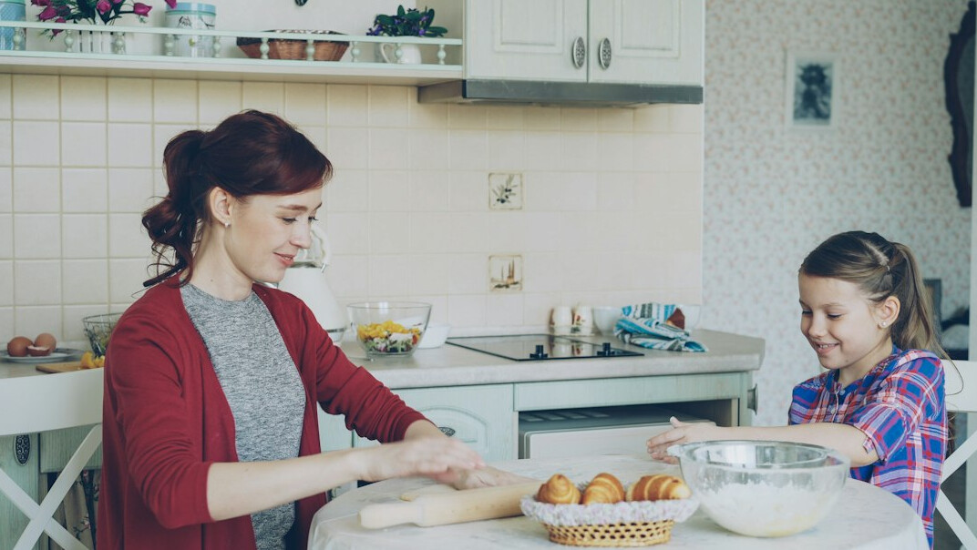 Danish woman baking bread in a home kitchen
